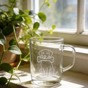 This is a etched mug with a puppy pattern.