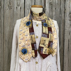 ലേസർ കട്ടിംഗ് ഉപയോഗിച്ച് നിർമ്മിച്ച റായേല ആർട്ട് നെക്ക്ടൈ സ്കാർഫ്.