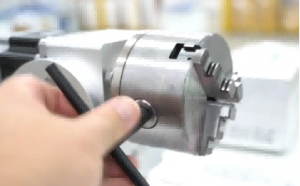 Three-jaw chuck laser engraving rotary attachment