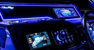 Laser-cut acrylic automotive dashboard with precise details.
