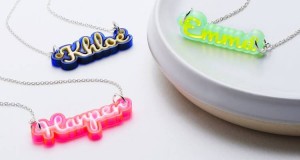 Laser-cut acrylic jewelry pieces.