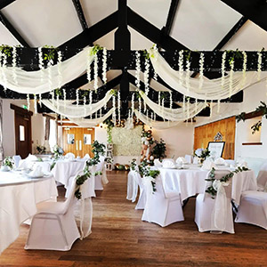 Laser-cut wedding ceiling drapes are both breathable and elegantly seamless.